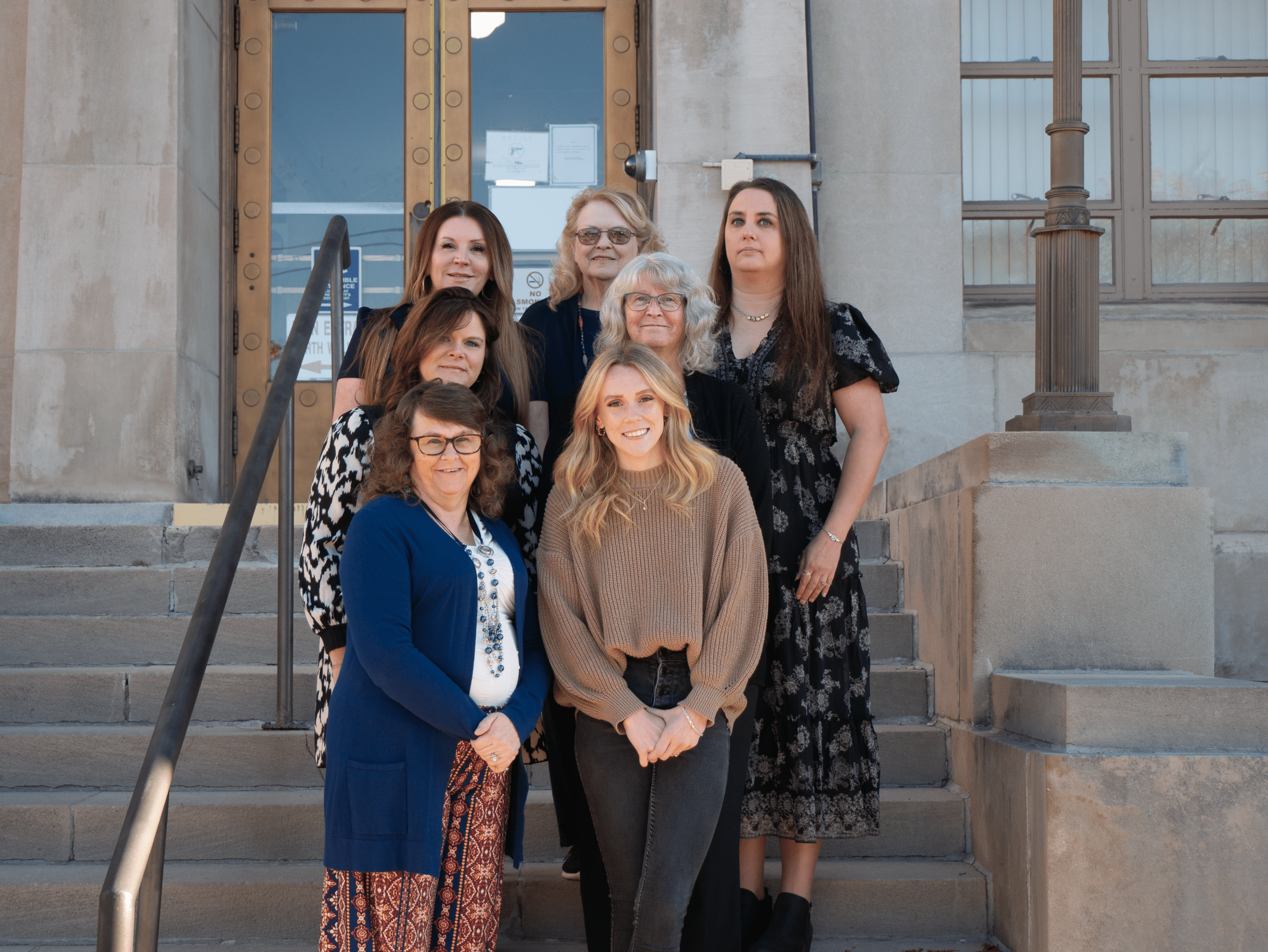 The Tax Division of the Mercer County Sheriff's Office in a group photo on the County Courthouse steps.