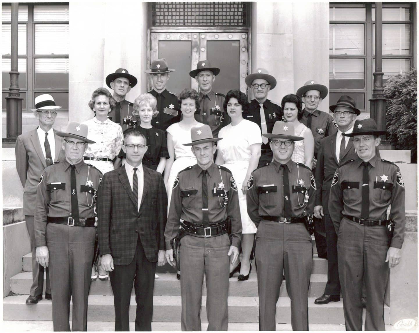 A historic photo of the Sheriff's Office staff from decades ago.