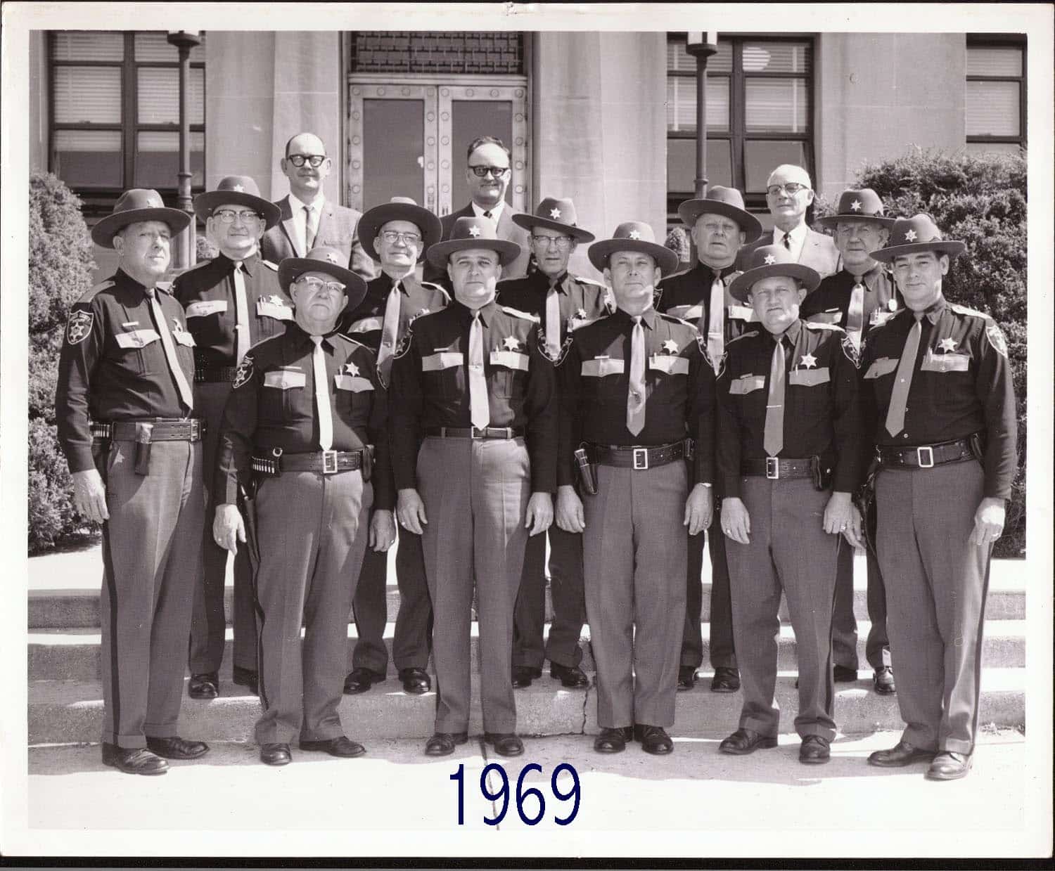 The deputies and leadership of the Mercer County Sheriff's Department in a photo from the year 1969.
